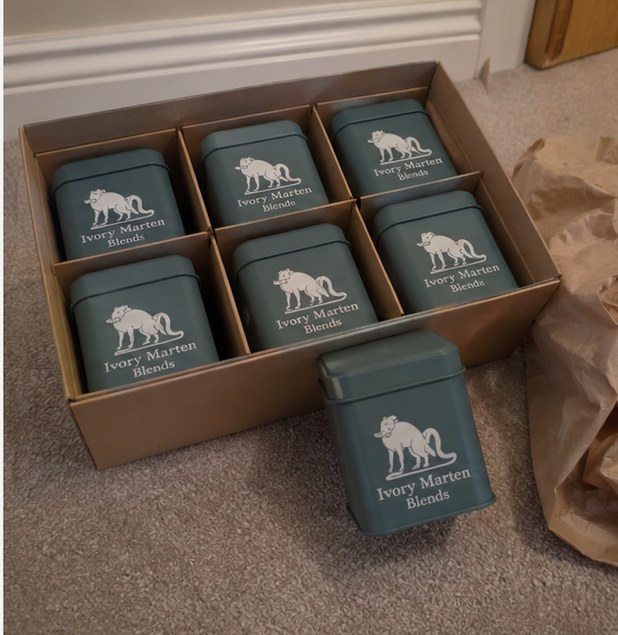 Tea tins with logo — customer photo